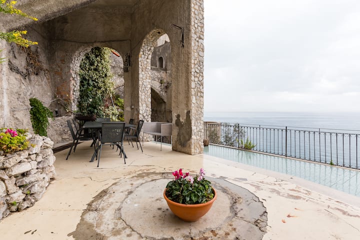 House with terrace on the sea