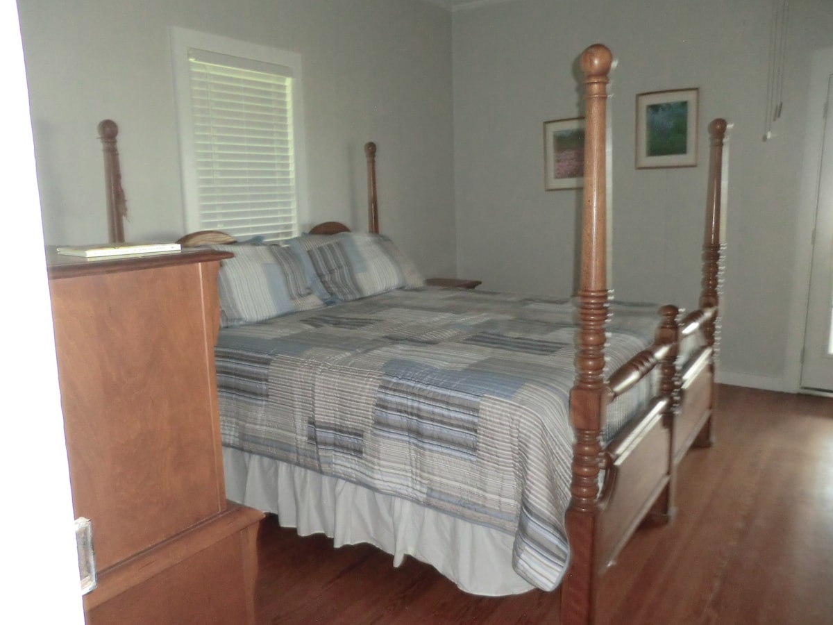 Bedroom with king size bed.