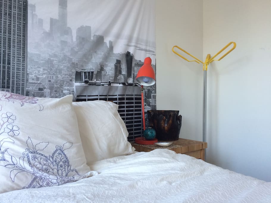 1 side of bed. coat stand