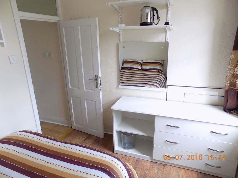You'll have a wardrobe, dressing table, bedside table, copious shelving and bed with large draws - ample storage space.