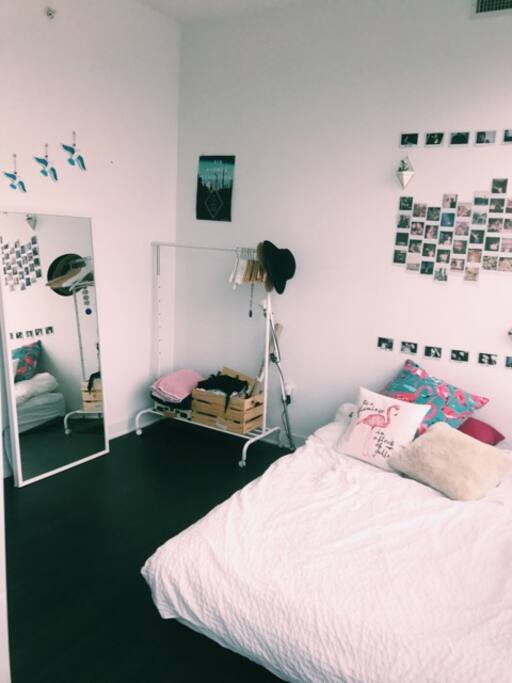 Private bedroom, a full mirror and a clothing rack