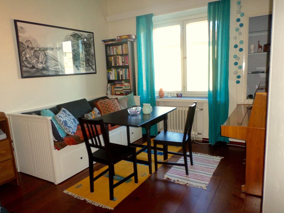 The sofa bed is comfortable for both dining and sleeping.