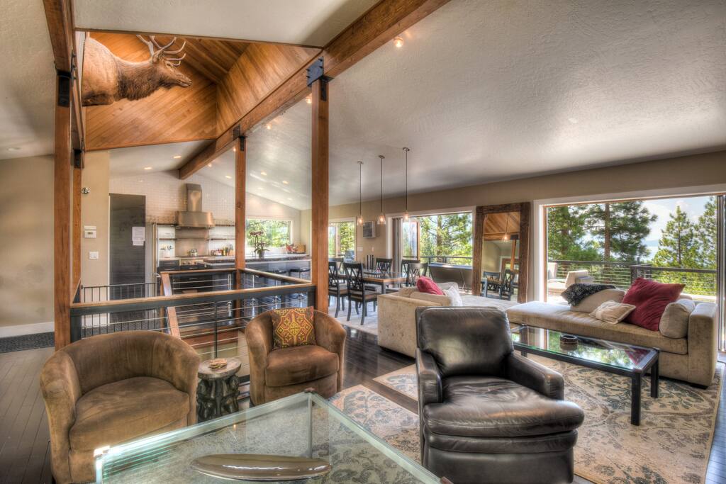 View of the open floor plan looking at living room, dining table, and kitchen