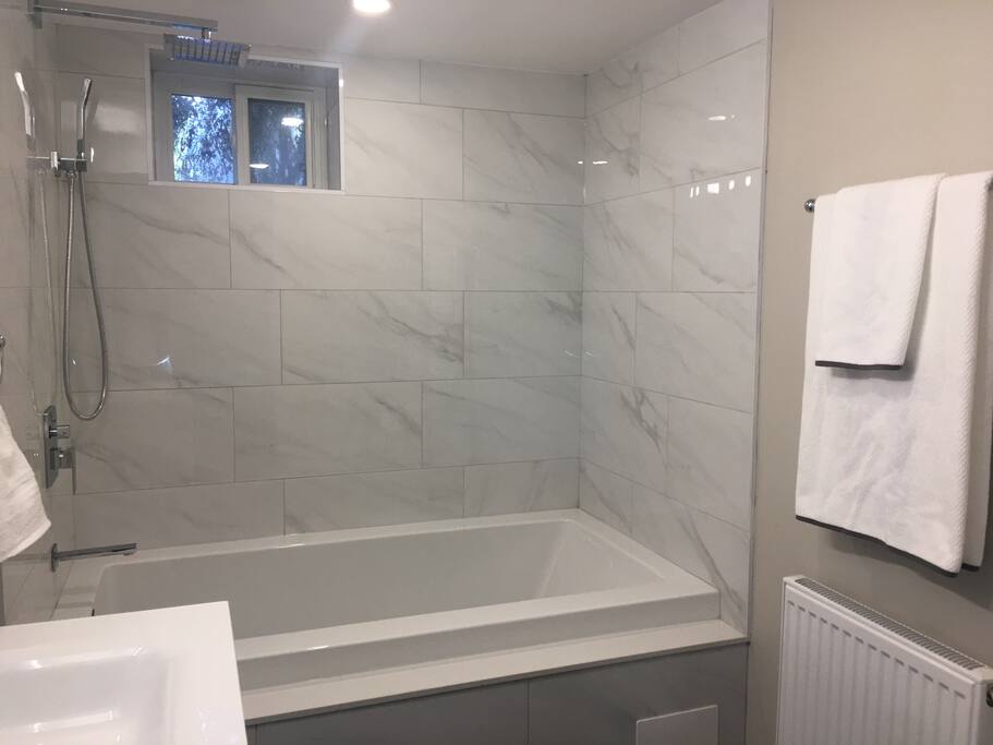 Oversized soaker tub with air jets for a relaxing bath