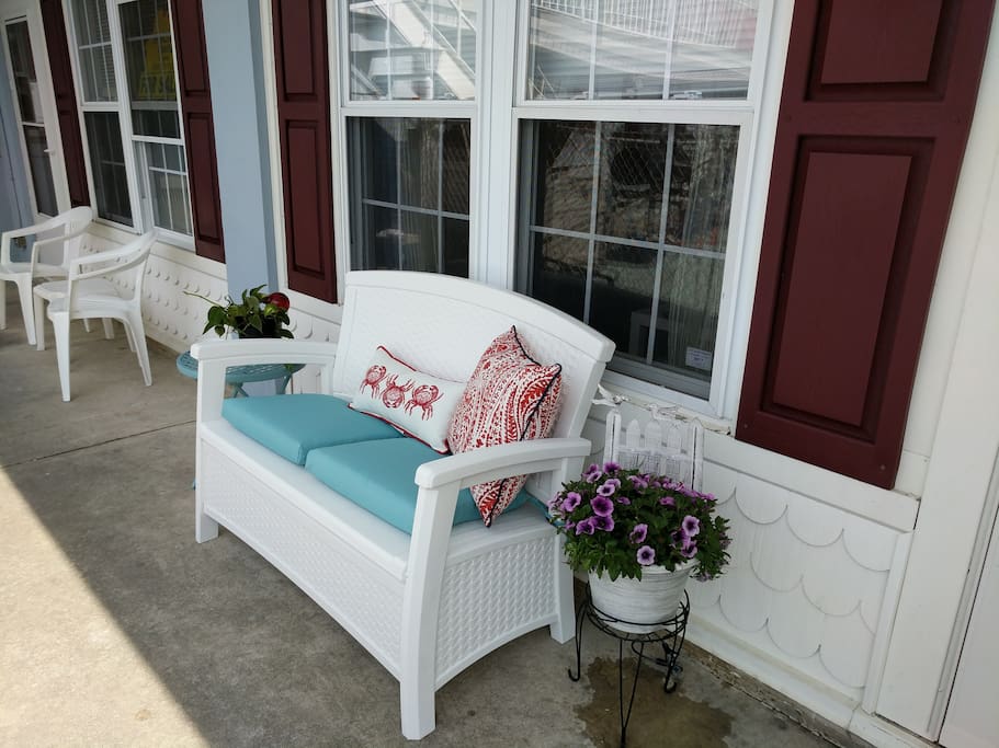 Enjoy coffee or a glass of wine out front.