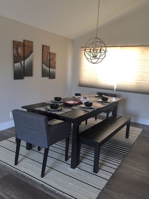Beautiful modern-contemporary dining room. Seats 8 total; all inclusive with silverware/tableware for each guest. (Only 6 pictured, 2 additional are readily available)