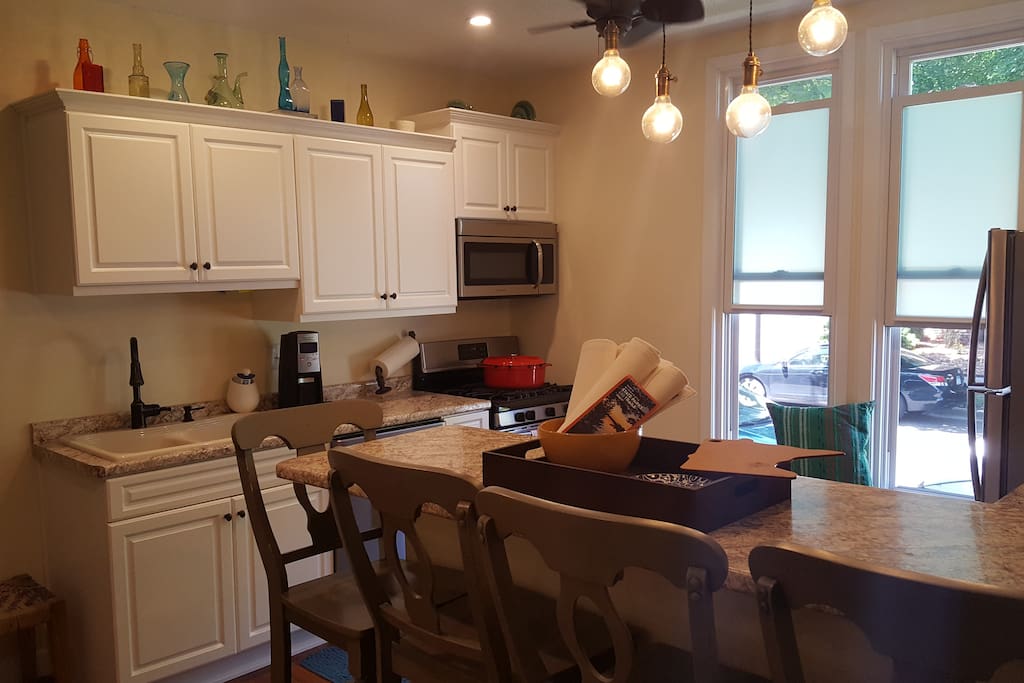 Recently renovated kitchen complete with coffee maker, pots/pans, plates, cups, etc. Some condiments available.