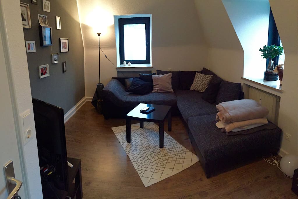 Wohnzimmer mit großer Schlafcouch