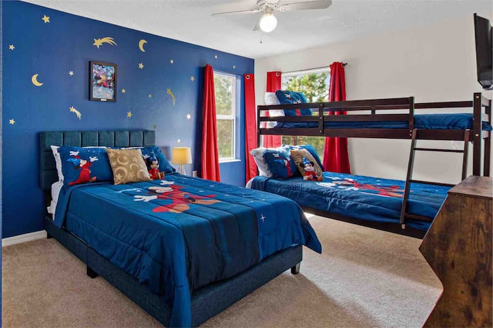 The Sorcerer Mickey Fantasia Room is filled with magic! This room features a full bed and a twin/full bunk bed on the second floor. This room shares a bathroom. Complete with toys and a TV. 