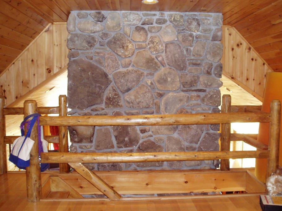 stairs from loft facing the living room