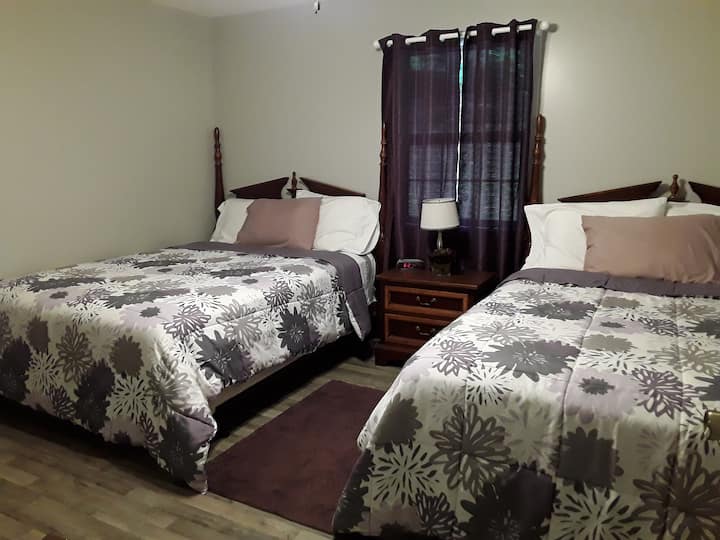 Bedroom #1 has 2 queen size comfy beds. Extra blankets and fresh linens. It also has a walk in closet and an on Suite adjoining bathroom.