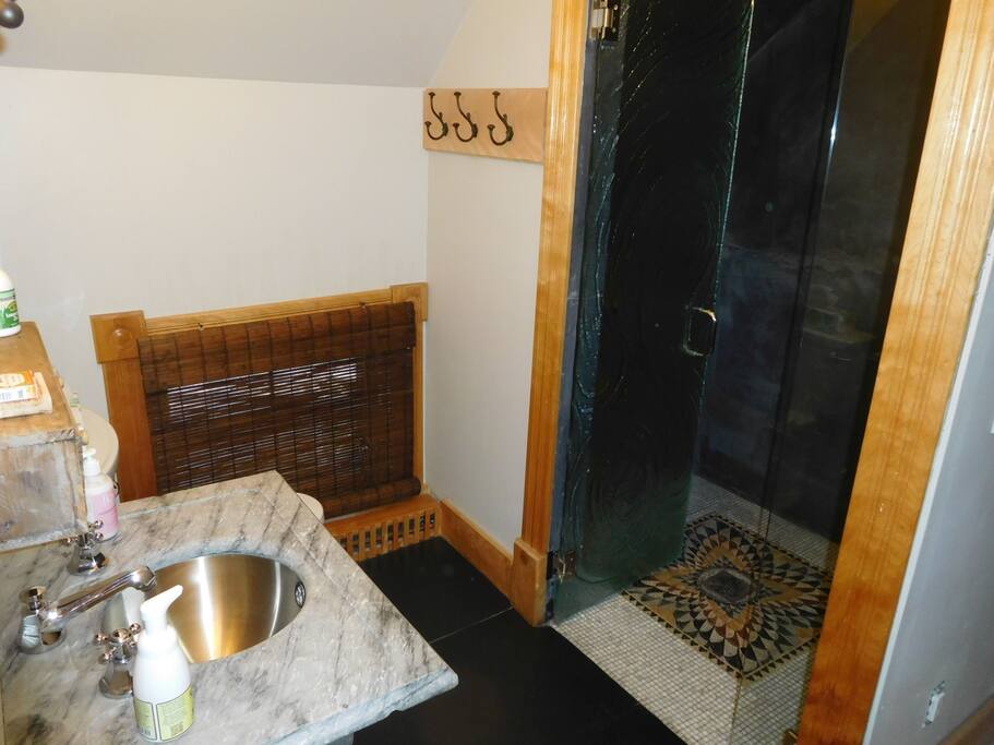 Steam shower, locally sourced slate walls and floor