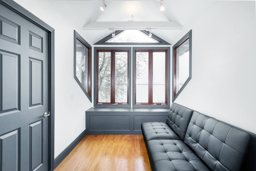 Lake view sun room in master bedroom