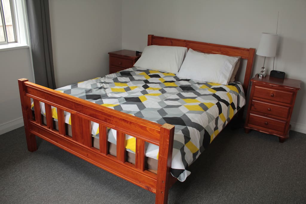 This is the master bedroom which has a very comfortable queen size bed, bed side draws and wardrobe for you convenience.