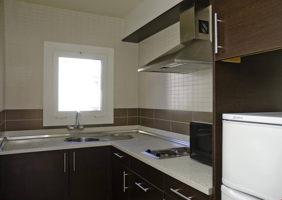 Make a quick meal in the fully-equipped kitchen.