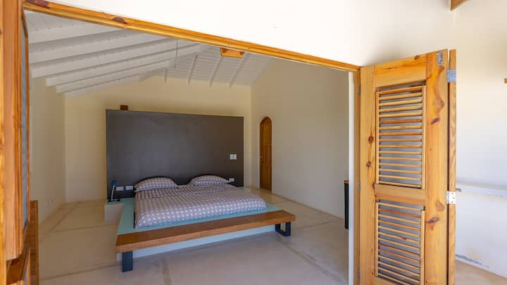 Bedroom left side: king, bathroom with sink, toilet, shower, closets, AC.