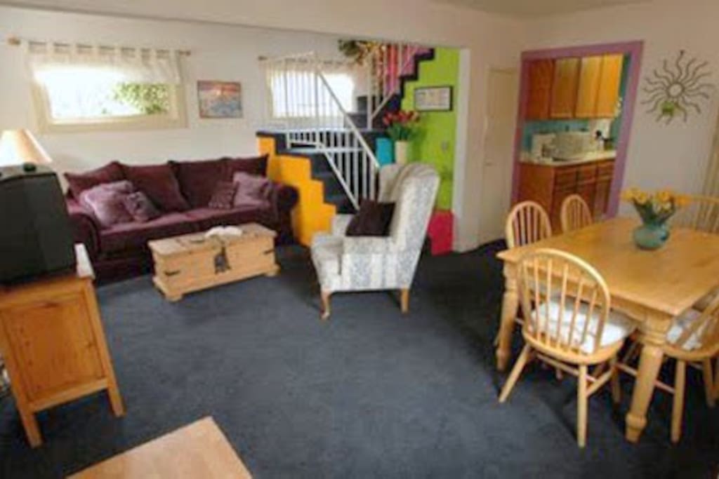 Enjoy family time in the colorful living room after a day at the beach