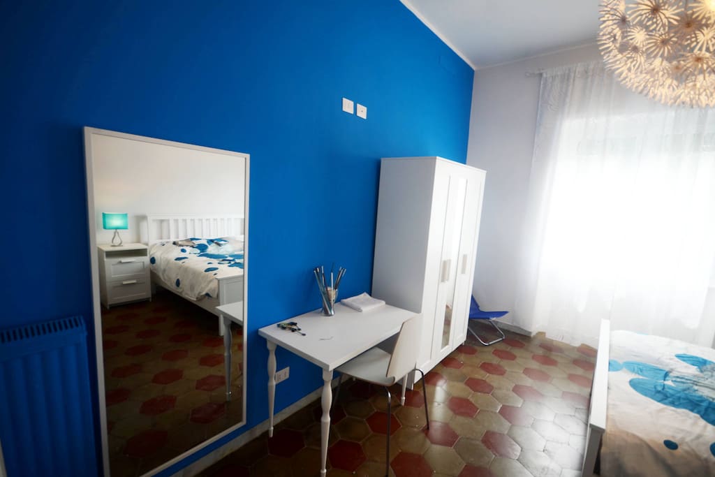 Comfortable triple room with shared bathroom