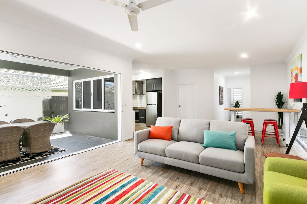 Air-conditioned Modern indoor living and outdoor dining