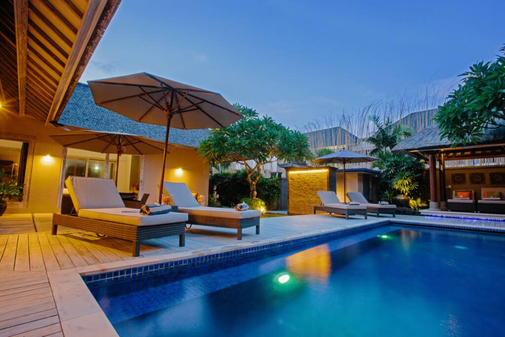 Swimming Pool with gazebo and garden view