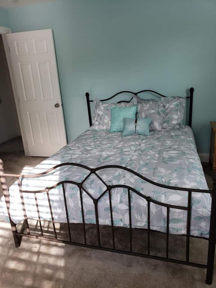 Master bedroom with queen bed