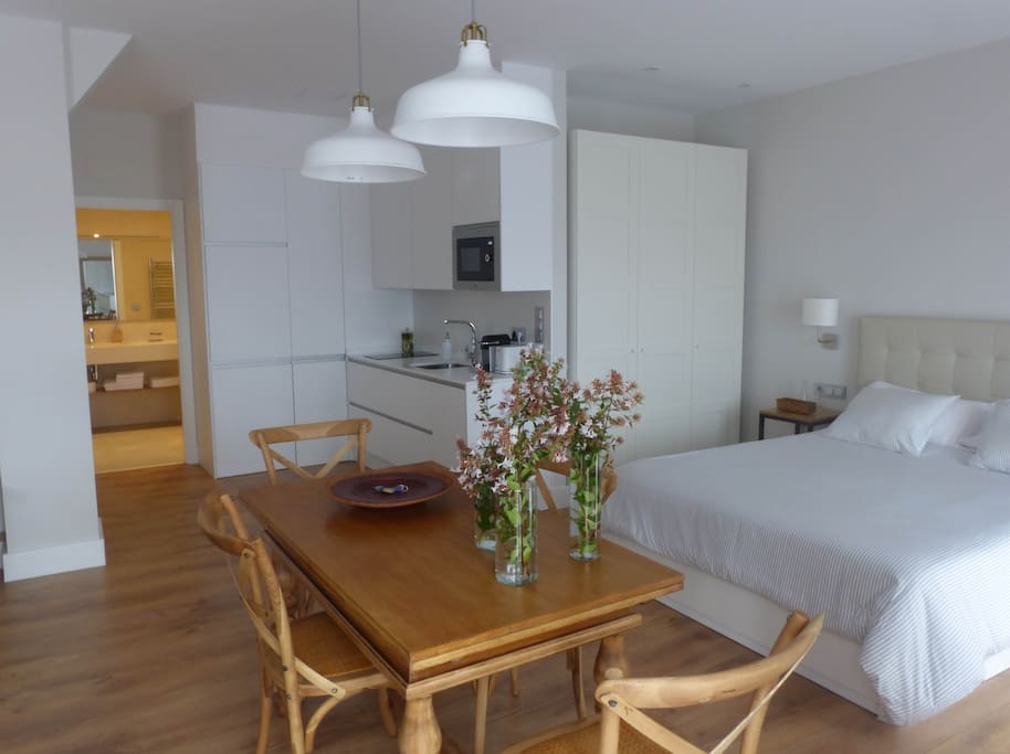 The bathroom, the kitchen and the double bed.