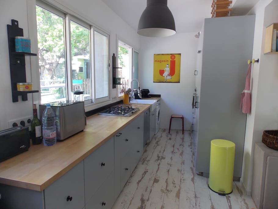 Cuisine de 16 m2 ouverte sur la pièce de vie
