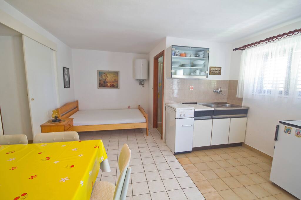 Living room, kitchen and beds
