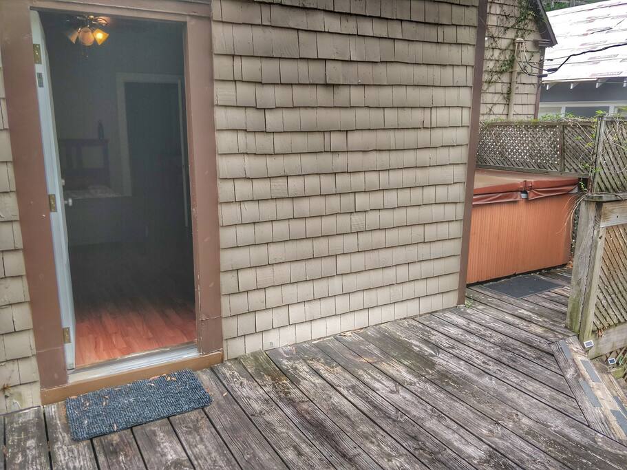 private entrance on Deck steps away from secluded hot tub
