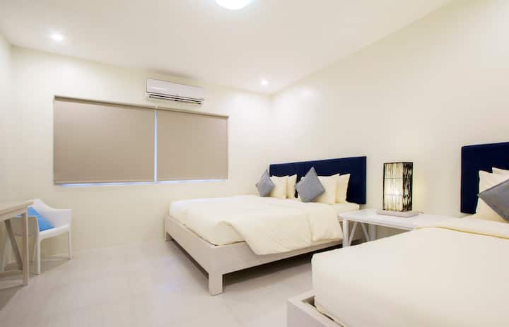 Ouano Beach House (Room 4) Triple-sharing