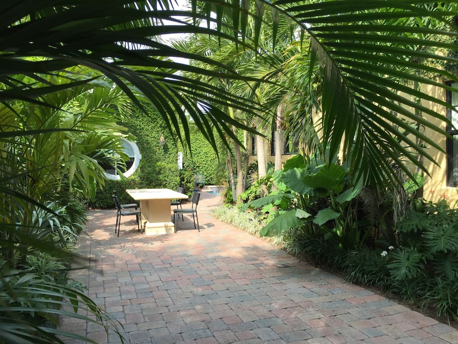 Table for 10 in front of round Cabana window