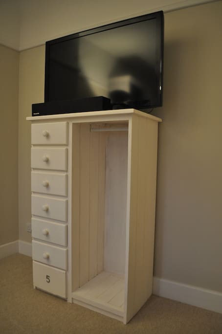 British made draws with rail to hand your clothes.