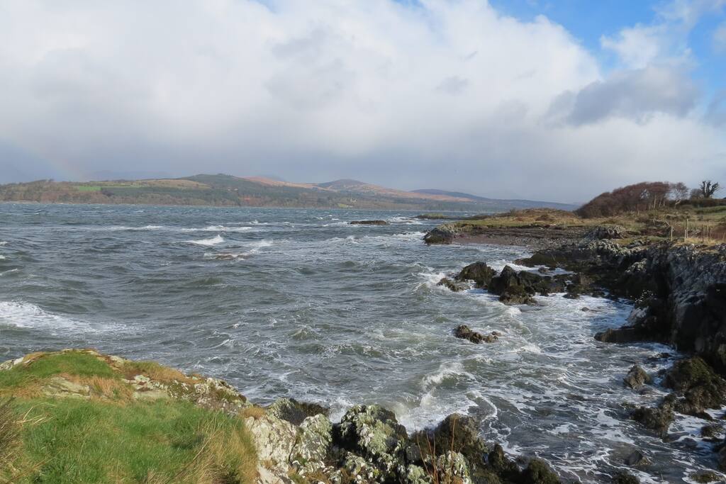 Sea, rocks & mountains.