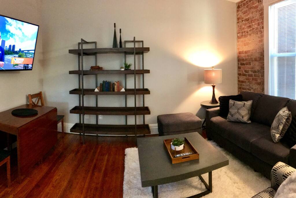 Enjoy the living room space - the table on the left folds out into a spacious dining table as well