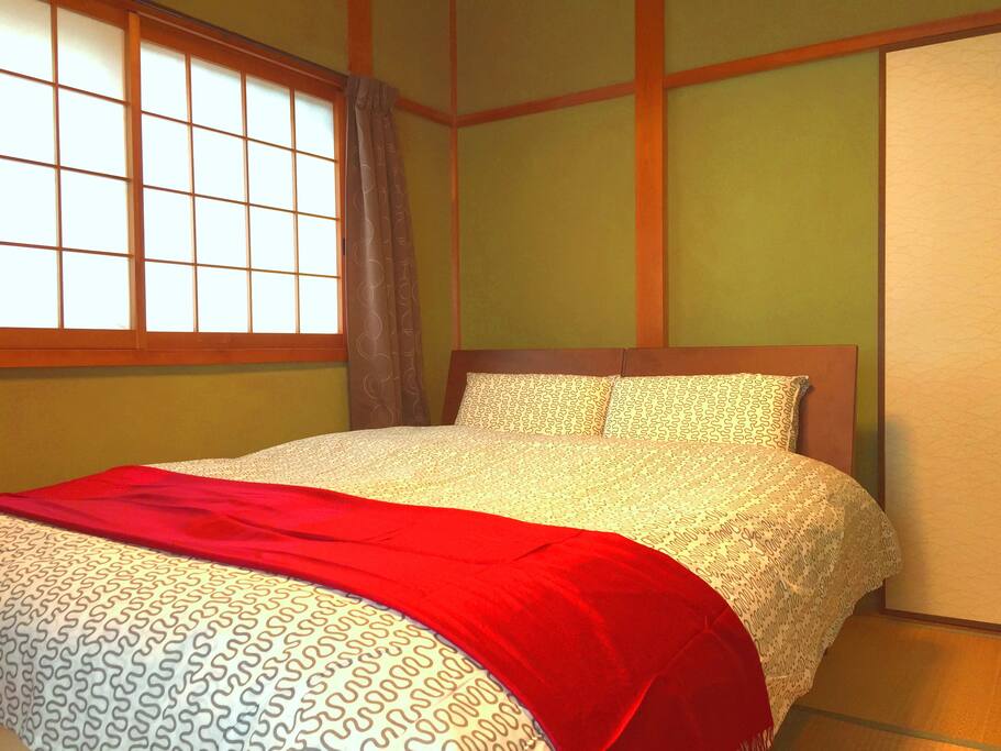 Bedroom #1 Modern Japanese Inspired Room. One double sized bed. High Pressured Mattress, very comfortable. Air-conditioned. Located on 2nd floor.