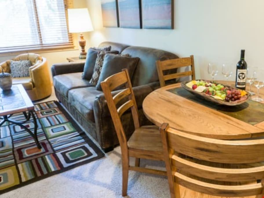 Take a seat in the comfortable living area and warm up in front of the fireplace.