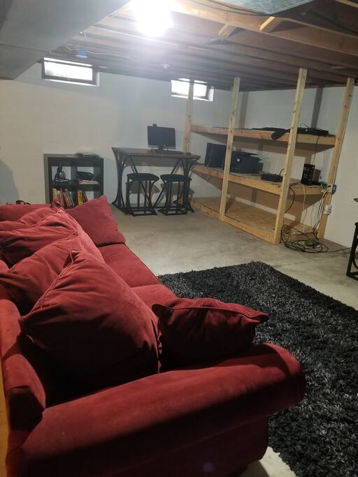 Unfinished basement with desktop computer with Wifi access