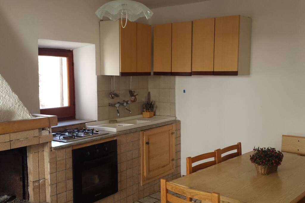 The kitchenn + fireplace