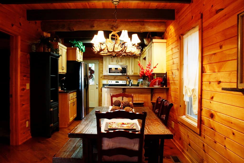 Look at the beaded board walls, plank floors, hickory cabinets, and local crafts.