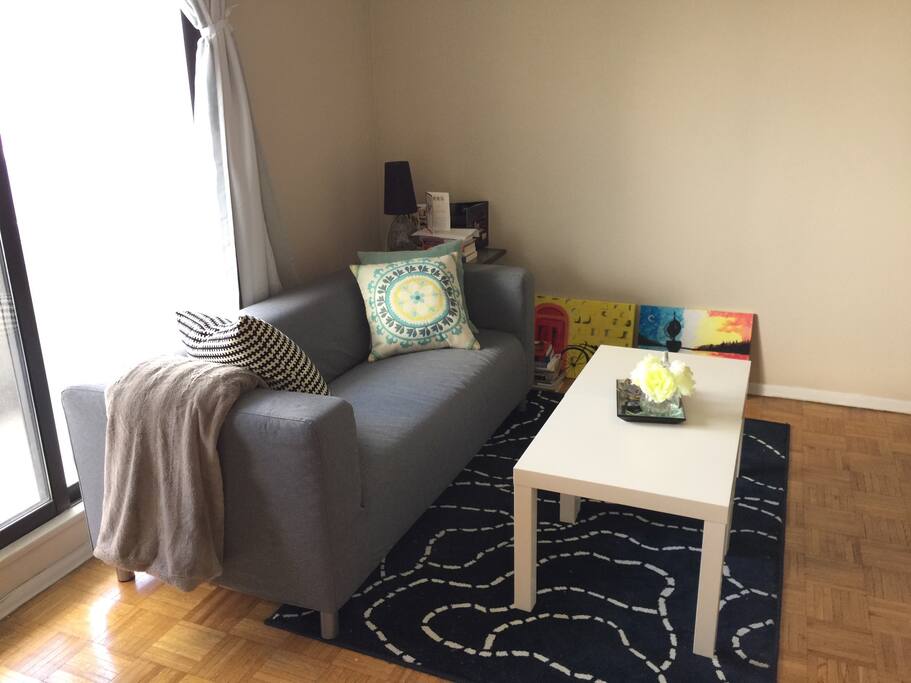 Living room area. Spacious balcony with great lighting.