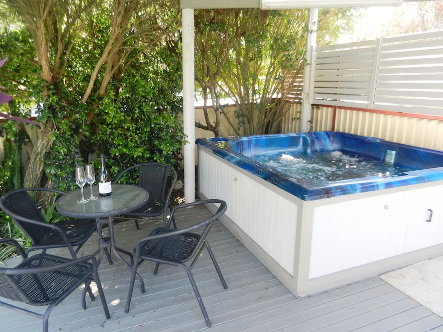 Unwind in the heated spa with a glass of wine under the enclosed pergola. Guests are welcome to use during their stay.