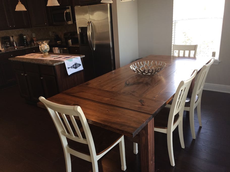 Gorgeous new farm house table where you can entertain 7-8 people comfortably. If you need more room to feed let us know and we can have the leafs/breadboards available to seat 8+