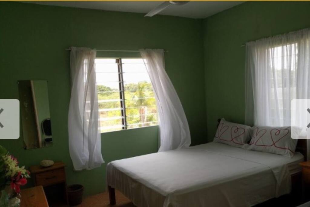 Curtains dance to a cool breeze.