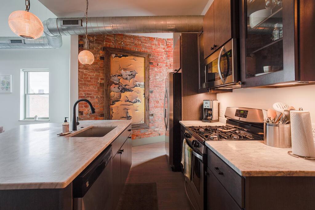 Kitchen island with pre-restoration art