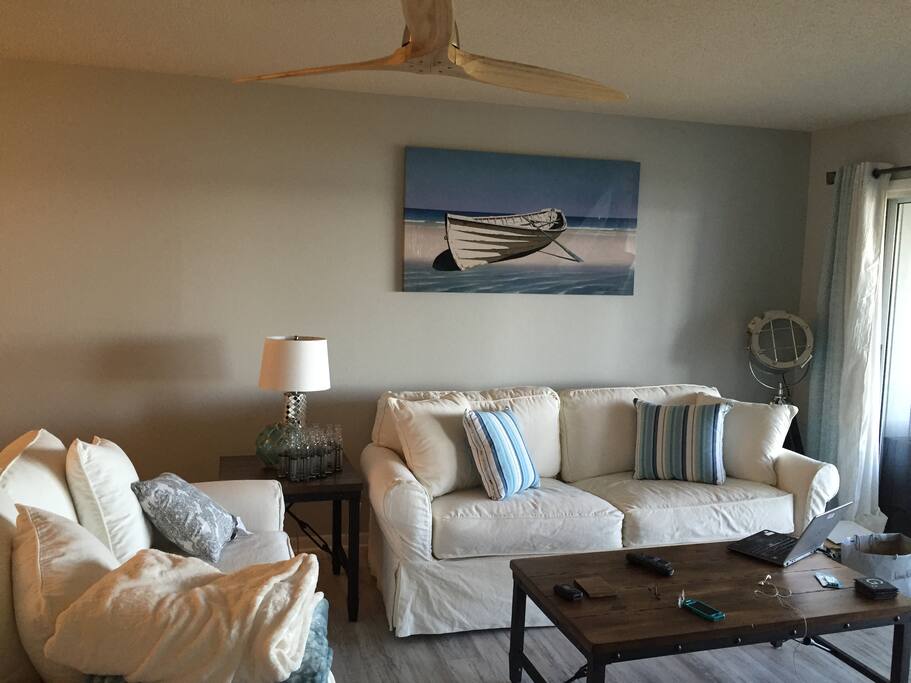 Relax in style while watching the dolphins and boats