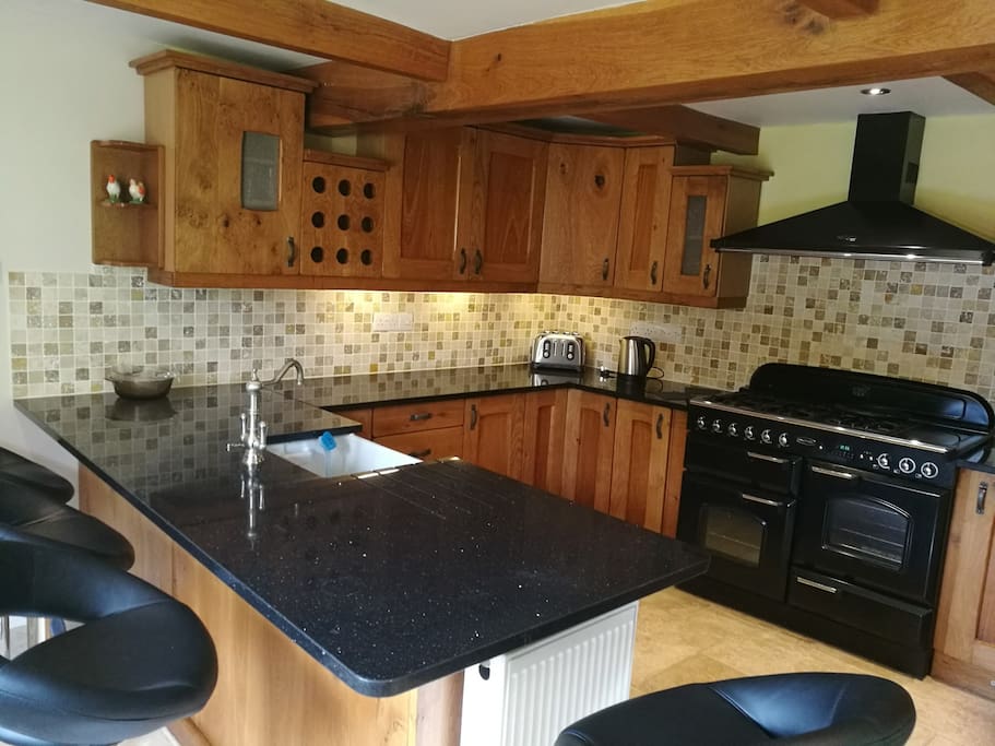 Kitchen with gas range cooker, kettle and toaster