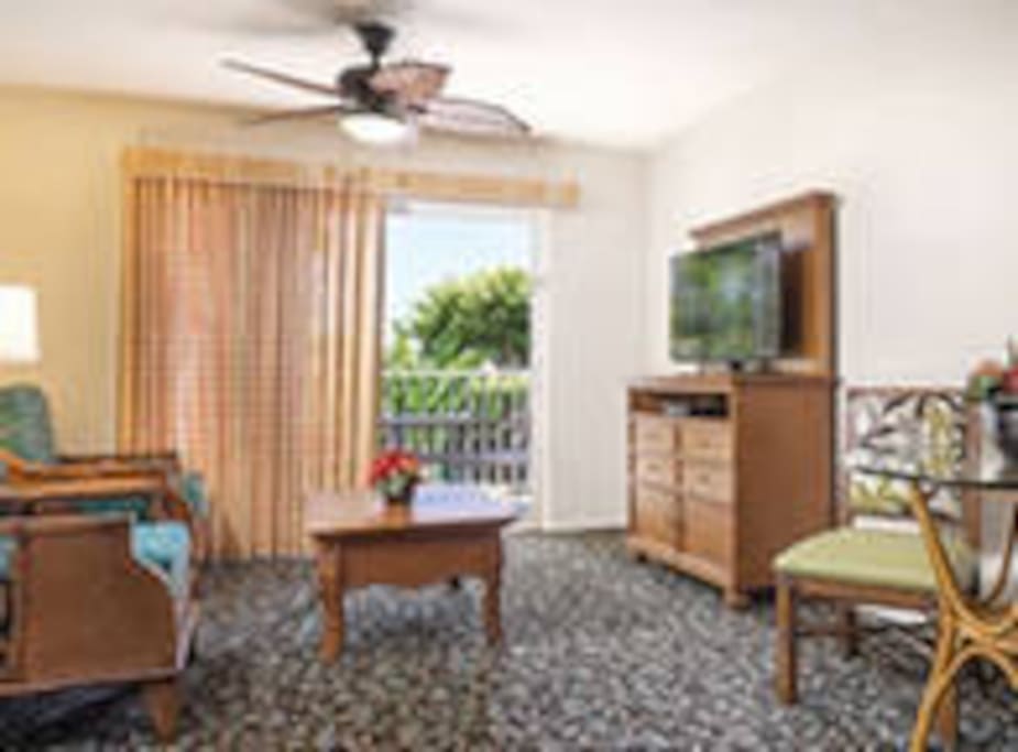living area and sliding door to the balcony