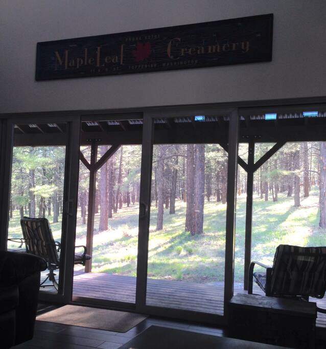 View from Living Room/Dining Room. Shaded porch all day keeps the living area very cool and comfortable.