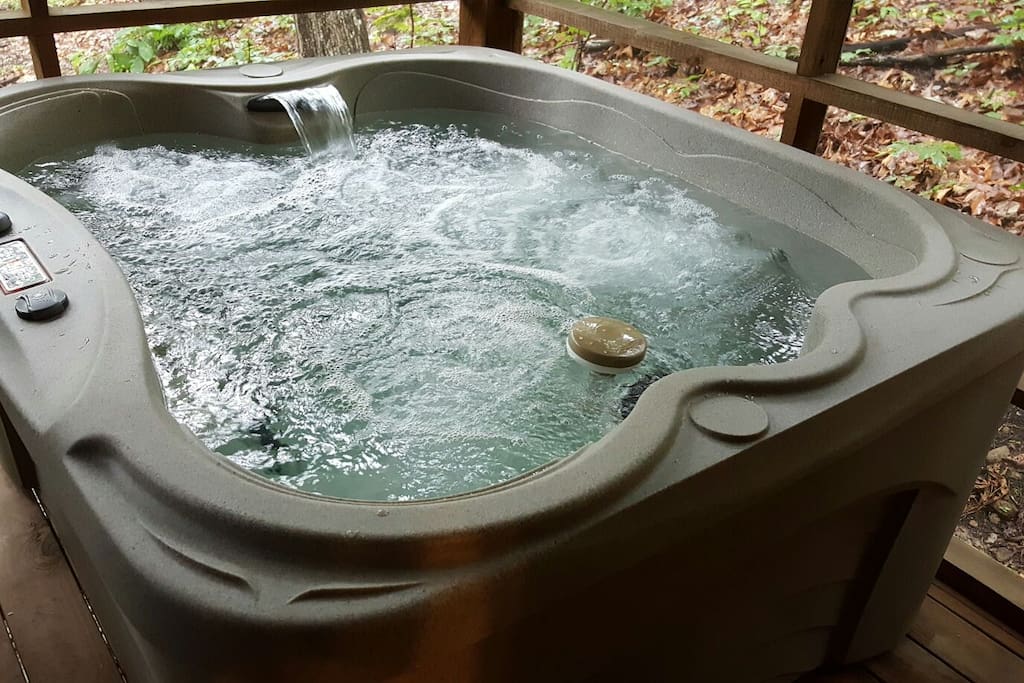 soak in our brand new hot tub with waterfall features