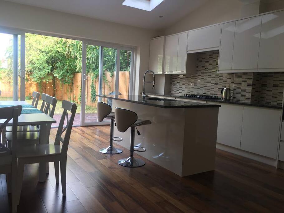 Open plan living room with kitchen and dining area